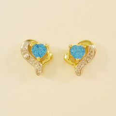 9K SOLID GOLD 0.45CT SWISS BLUE TOPAZ AND DIAMOND STUD EARRINGS.