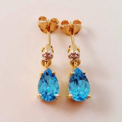 9K SOLID GOLD 2.10CT SWISS BLUE TOPAZ AND DIAMOND EARRINGS.