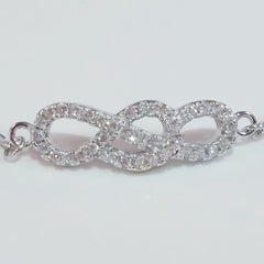 925 STERLING SILVER BRACELET WITH INFINITY CHARM PAVED WITH  SPARKLING CZ CRYSTALS.