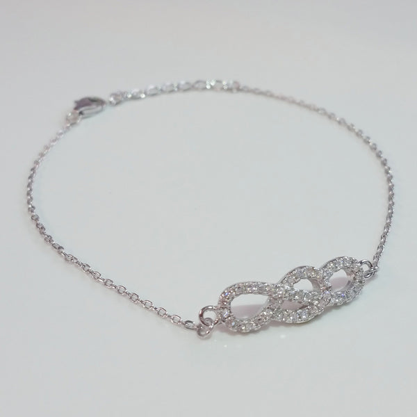 925 STERLING SILVER BRACELET WITH INFINITY CHARM PAVED WITH  SPARKLING CZ CRYSTALS.