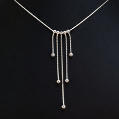 925 STERLING SILVER NECKLACE WITH FIVE FLOATING DROPS.