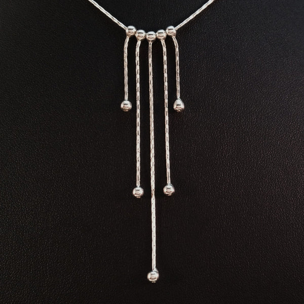925 STERLING SILVER NECKLACE WITH FIVE FLOATING DROPS.