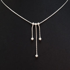 925 STERLING SILVER NECKLACE WITH THREE FLOATING DROPS.