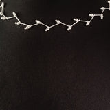925 STERLING SILVER CHOKER WITH INTRICATE KINK DESIGN.