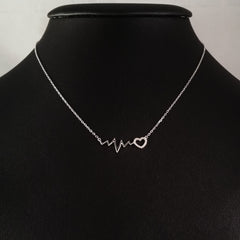 925 STERLING SILVER NECKLACE WITH EKG HEARTBEAT AND LOVE-HEART PENDANT SET IN SPARKLING CRYSTALS.