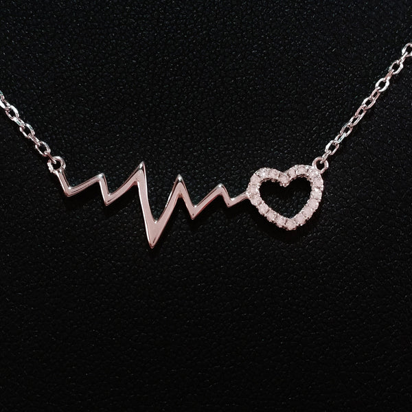 925 STERLING SILVER NECKLACE WITH EKG HEARTBEAT AND LOVE-HEART PENDANT SET IN SPARKLING CRYSTALS.