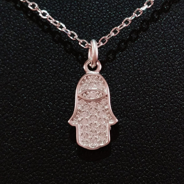 925 STERLING SILVER NECKLACE WITH TURKISH EVIL EYE CHARM AND HAMSA HAND PENDANT SET IN SPARKLING CRYSTALS.