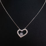 925 STERLING SILVER NECKLACE WITH OPEN HEART EVIL EYE PENDANT SET IN SPARKLING CRYSTALS.