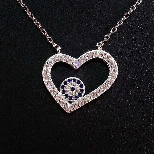 925 STERLING SILVER NECKLACE WITH OPEN HEART EVIL EYE PENDANT SET IN SPARKLING CRYSTALS.