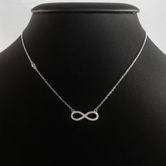 925 STERLING SILVER NECKLACE WITH ETERNITY PENDANT SET IN SPARKLING CRYSTALS.
