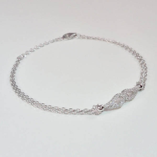 925 STERLING SILVER BRACELET WITH ANGEL WINGS CHARM PAVED WITH  SPARKLING CZ CRYSTALS.