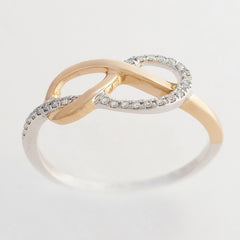 9K SOLID ROSE GOLD & WHITE GOLD INFINITY RING WITH 26 DIAMONDS.