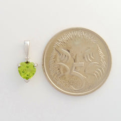 9K SOLID WHITE GOLD 0.50CT NATURAL PERIDOT AND DIAMOND PENDANT.