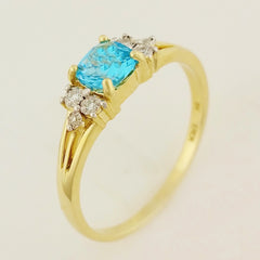 9K SOLID YELLOW GOLD 0.60CT NATURAL BLUE TOPAZ RING WITH 6 DIAMONDS.