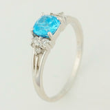 9K SOLID WHITE GOLD 0.60CT NATURAL BLUE TOPAZ RING WITH 6 DIAMONDS.