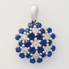 9K SOLID WHITE GOLD 0.85CT NATURAL SAPPHIRE CLUSTER PENDANT WITH SEVEN DIAMONDS.