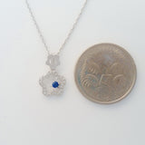 9K SOLID WHITE GOLD 45CM NECKLACE WITH NATURAL SAPPHIRE AND 25 DIAMOND PENDANT.