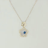 9K SOLID WHITE GOLD 45CM NECKLACE WITH NATURAL SAPPHIRE AND 25 DIAMOND PENDANT.