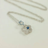 9K SOLID WHITE GOLD 45CM NECKLACE WITH NATURAL SAPPHIRE AND 25 DIAMOND PENDANT.