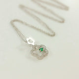 9K SOLID WHITE GOLD 45CM NECKLACE WITH NATURAL EMERALD AND 25 DIAMOND PENDANT.