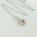 9K SOLID WHITE GOLD 45CM NECKLACE WITH NATURAL RUBY AND 25 DIAMOND PENDANT.