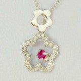 9K SOLID WHITE GOLD 45CM NECKLACE WITH NATURAL RUBY AND 25 DIAMOND PENDANT.