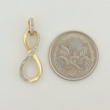 9K SOLID GOLD 0.02CT INFINITY ETERNITY PENDANT WITH 4 DIAMONDS.