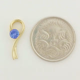 9K SOLID GOLD 0.29CT TANZANITE PENDANT.