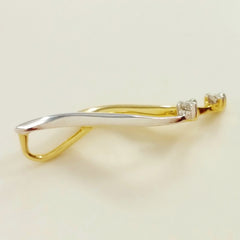 9K SOLID YELLOW AND WHITE GOLD PENDANT WITH TWO DIAMONDS.