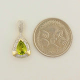 SOLID 9K YELLOW GOLD 0.70CT ART DECO STYLE NATURAL PERIDOT AND DIAMOND PENDANT.