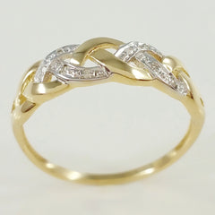 9K SOLID GOLD ENDLESS KNOT CELTIC BAND RING WITH 8 DIAMONDS.