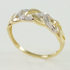 9K SOLID GOLD ENDLESS KNOT CELTIC BAND RING WITH 8 DIAMONDS.