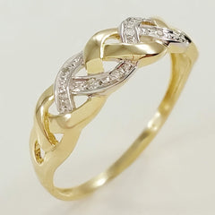 9K SOLID GOLD ENDLESS KNOT CELTIC BAND RING WITH 8 DIAMONDS.