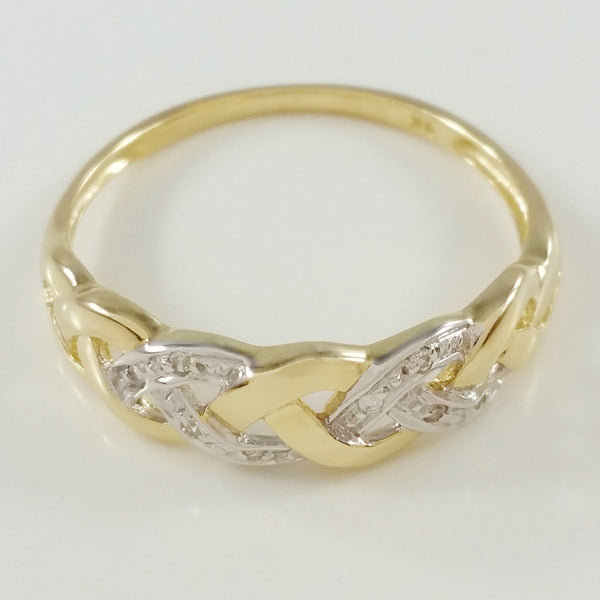 9K SOLID GOLD ENDLESS KNOT CELTIC BAND RING WITH 8 DIAMONDS.