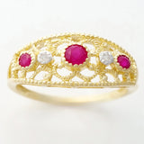 9K SOLID GOLD 0.30CT NATURAL RUBY NAVETTE STYLE RING WITH 2 DIAMONDS.