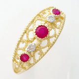 9K SOLID GOLD 0.30CT NATURAL RUBY NAVETTE STYLE RING WITH 2 DIAMONDS.