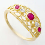 9K SOLID GOLD 0.30CT NATURAL RUBY NAVETTE STYLE RING WITH 2 DIAMONDS.