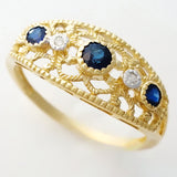 9K SOLID GOLD 0.30CT NATURAL SAPPHIRE NAVETTE STYLE RING WITH 2 DIAMONDS.