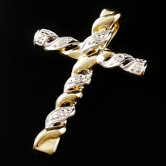9K SOLID GOLD CROSS PENDANT WITH 7 DIAMONDS.
