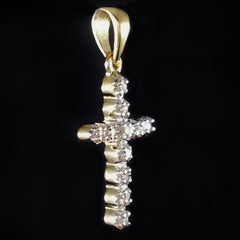 9K SOLID GOLD CROSS PENDANT WITH 11 DIAMONDS.