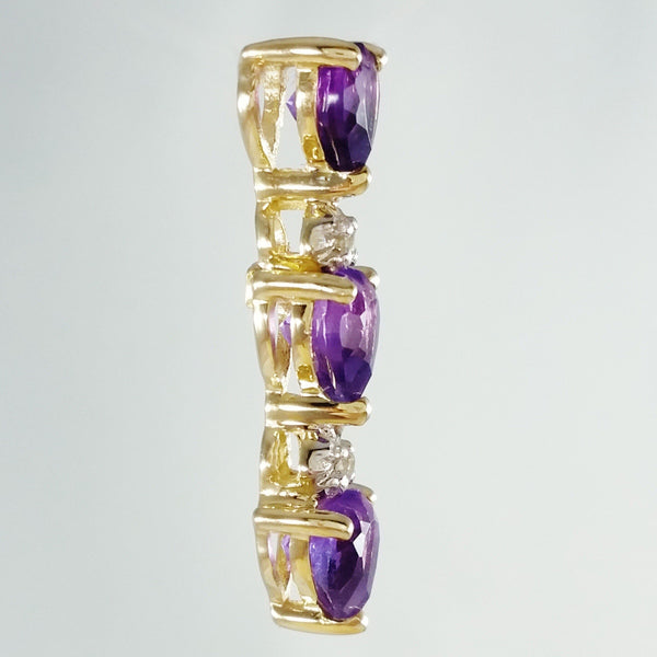 9K SOLID GOLD 0.70CT NATURAL AMETHYST PENDANT WITH 2 DIAMONDS.