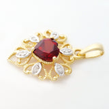 9K SOLID GOLD 0.95CT ALMANDINE GARNET FILIGREE PENDANT WITH 6 DIAMONDS.