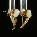 9K SOLID GOLD 0.50CT NATURAL OPAL EARRINGS WITH FOUR DIAMONDS.