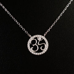 925 STERLING SILVER NECKLACE WITH OM NAMASTE PENDANT SET IN SPARKLING CRYSTALS.