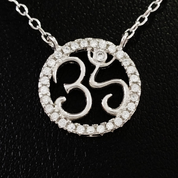 925 STERLING SILVER NECKLACE WITH OM NAMASTE PENDANT SET IN SPARKLING CRYSTALS.