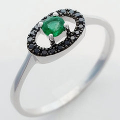 9K SOLID WHITE GOLD 0.15CT NATURAL EMERALD AND 19 BLACK DIAMOND RING.
