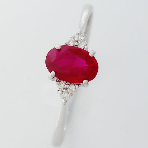 9K SOLID WHITE GOLD 0.60CT NATURAL OVAL RUBY RING WITH 6 DIAMONDS.