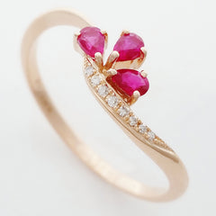 9K SOLID ROSE GOLD 0.20CT NATURAL RUBY CLUSTER RING WITH 8 DIAMONDS.