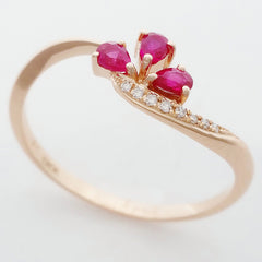 9K SOLID ROSE GOLD 0.20CT NATURAL RUBY CLUSTER RING WITH 8 DIAMONDS.