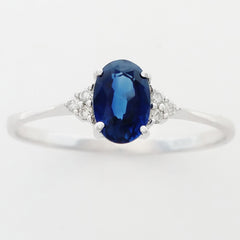 9K SOLID WHITE GOLD 0.50CT NATURAL OVAL BLUE SAPPHIRE RING WITH 6 DIAMONDS.